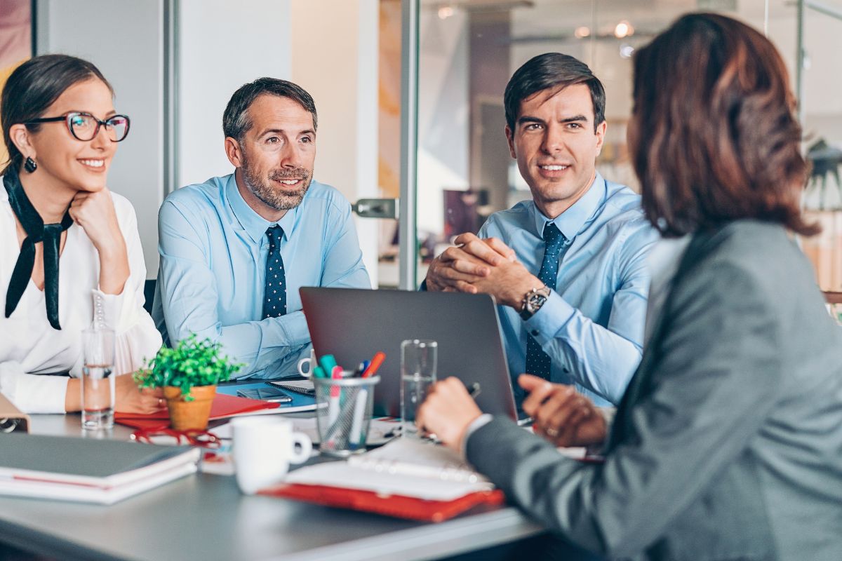 A picture of people conversing with each other.