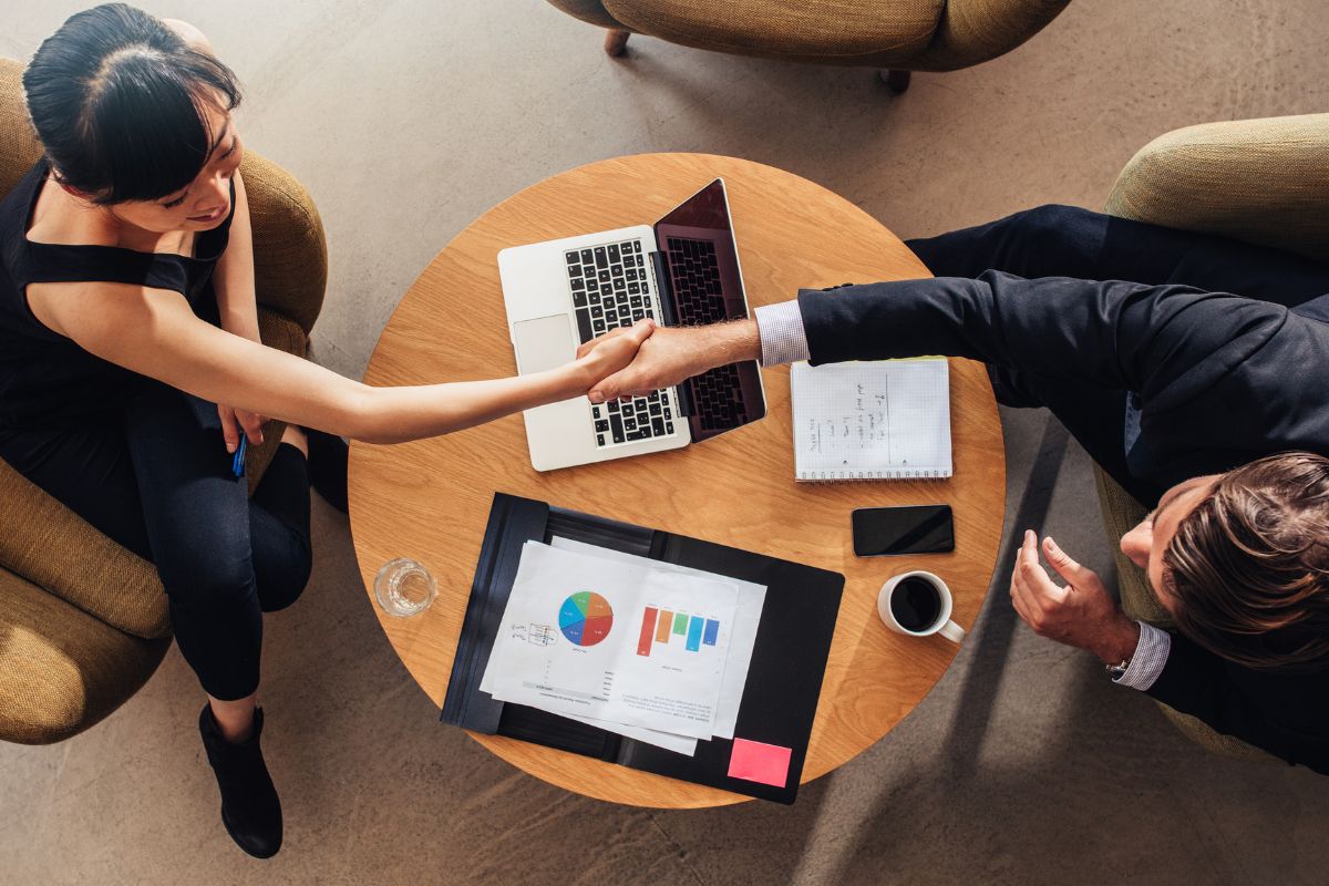 A picture of people shaking hands.