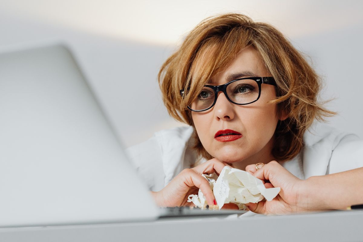 A picture of someone looking at their gadget.