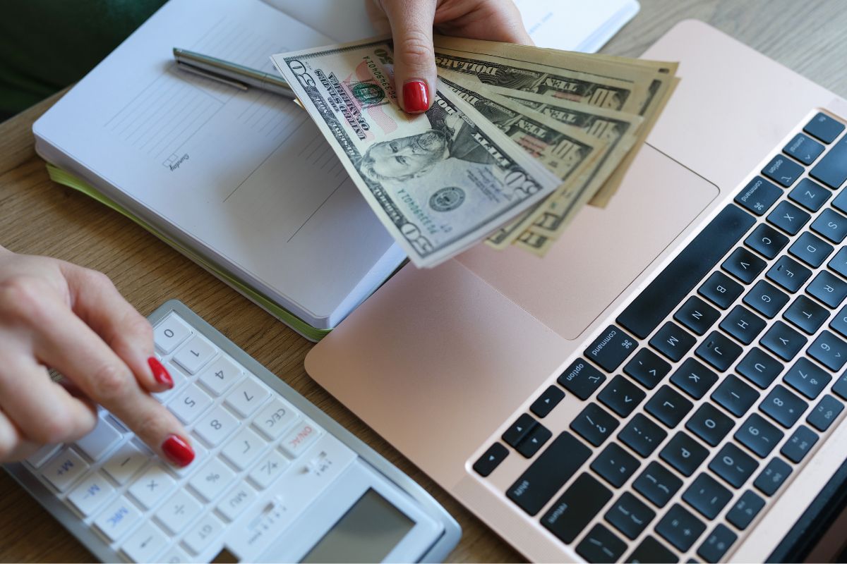 A picture of someone counting their money.