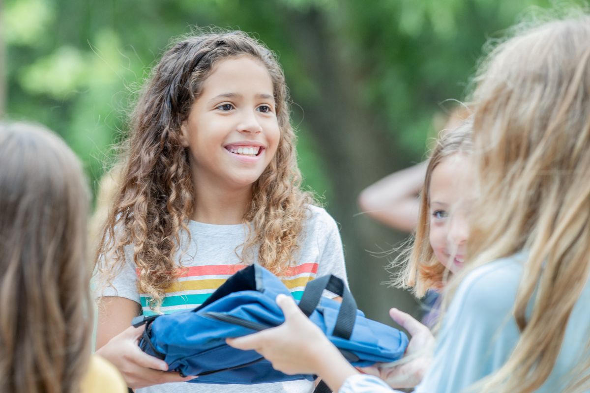 A picture of kids smiling.