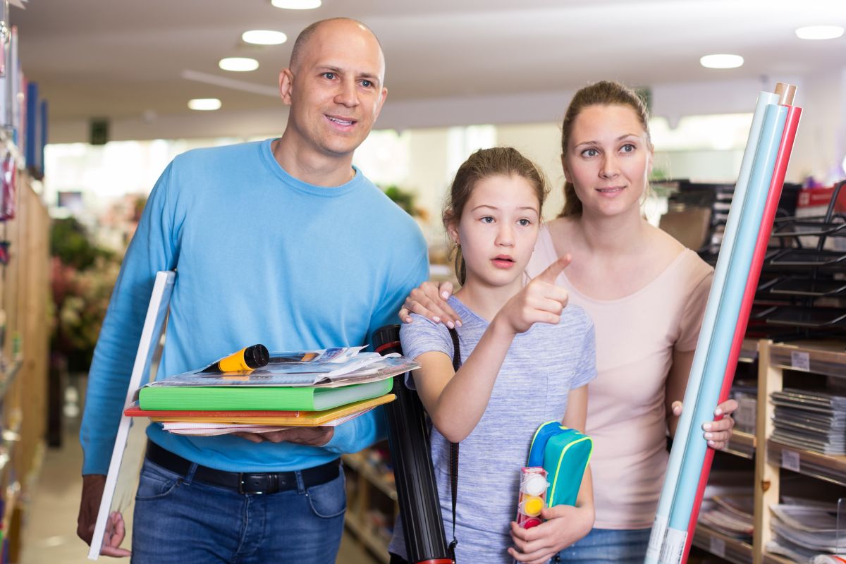 A picture of a family smiling. 
