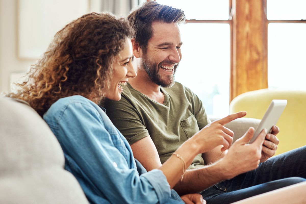 A picture of a couple smiling. 