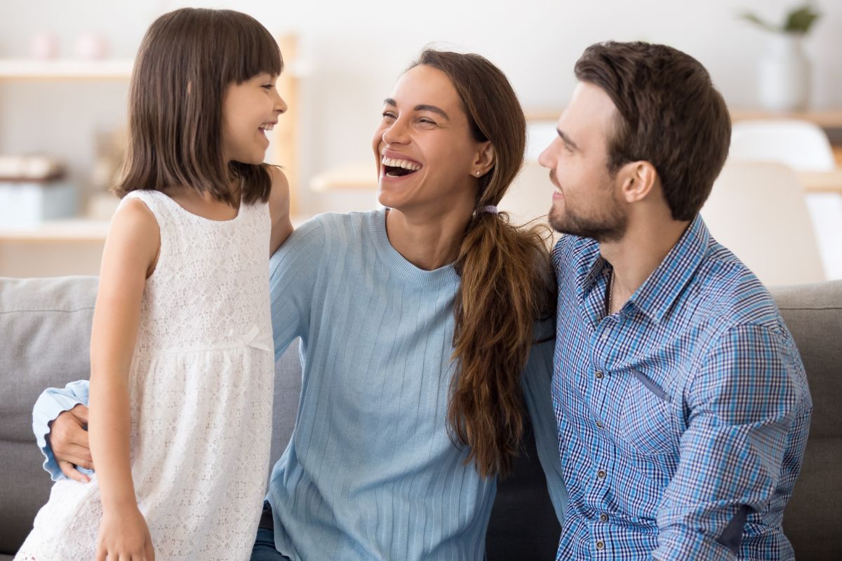 A picture of a happy family. 