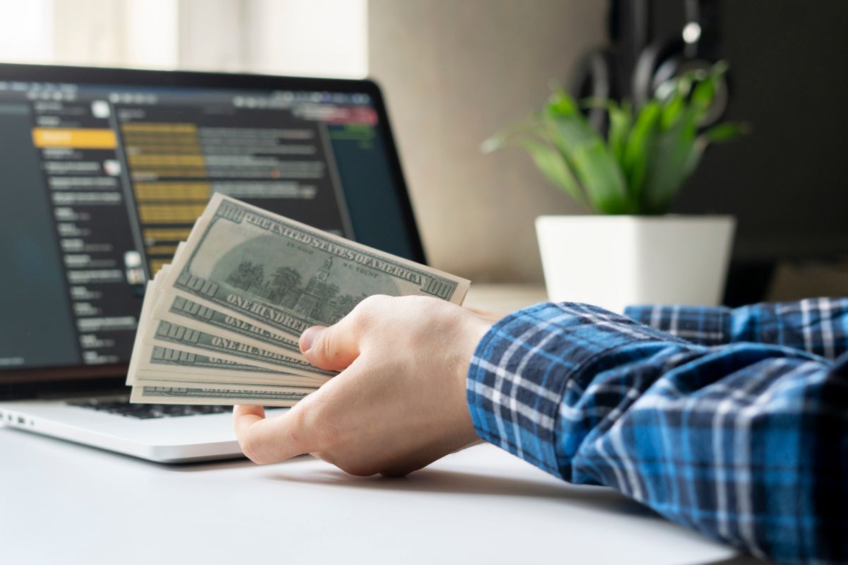 A picture of someone making money.