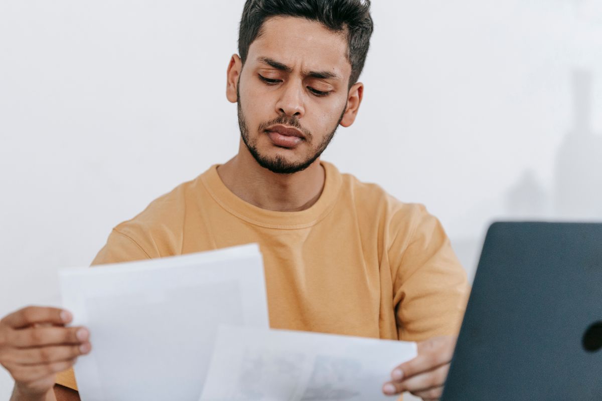 A picture of someone reviewing papers.