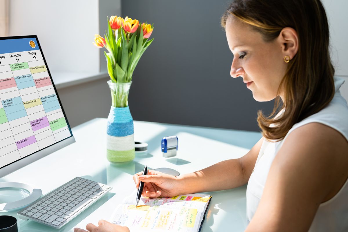 A picture of a mom scheduling. 