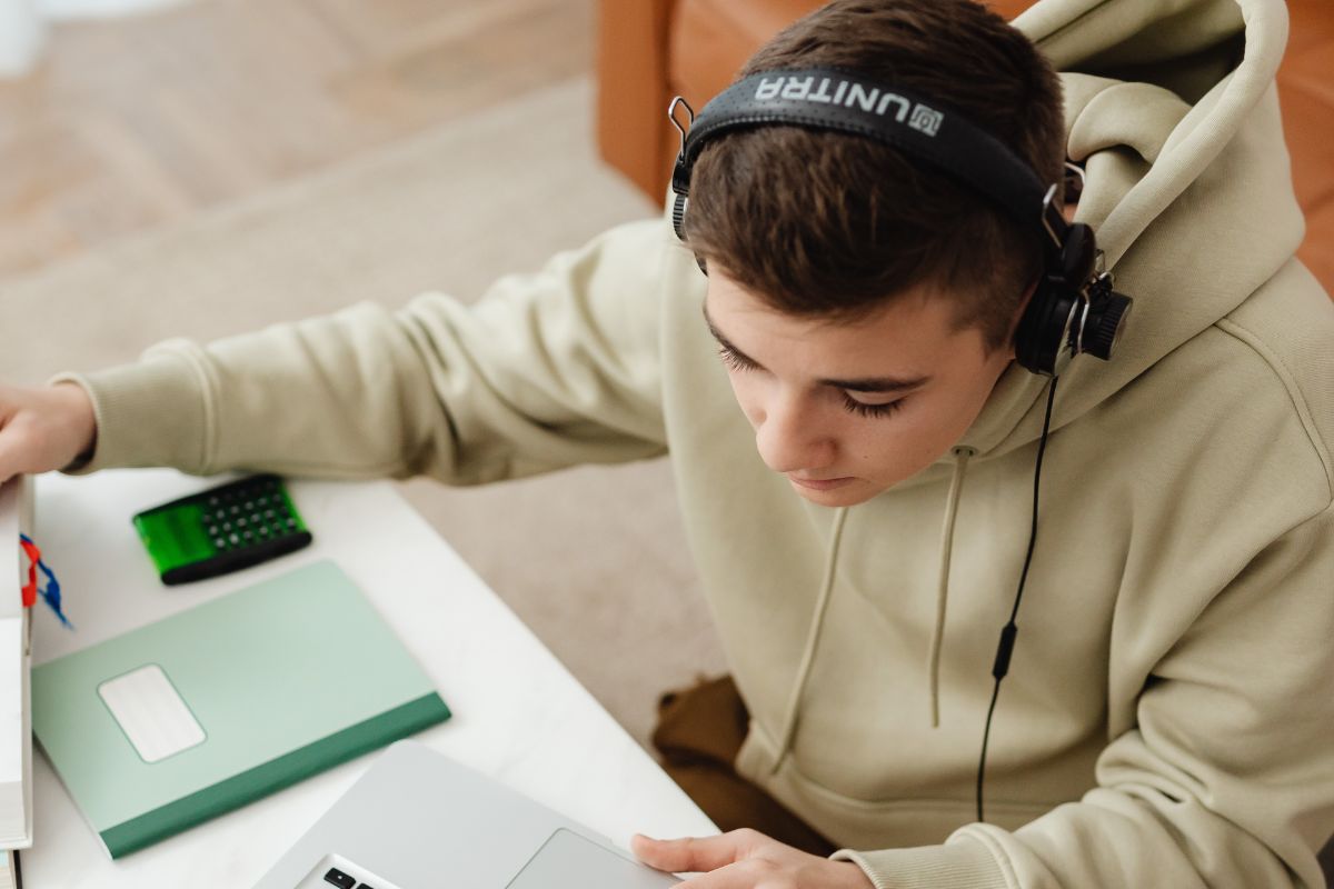 A picture of someone listening to music. 