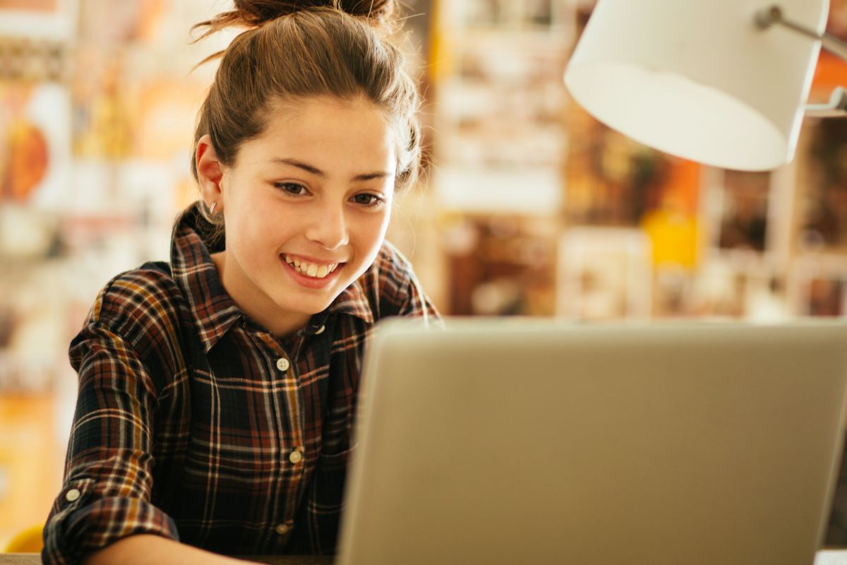 A picture of a lady using her laptop. 
