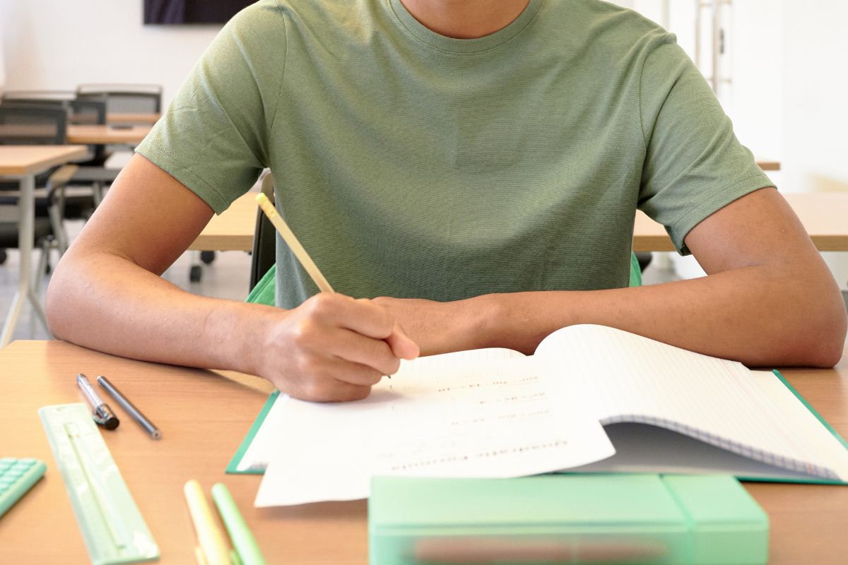 A picture of someone writing something. 