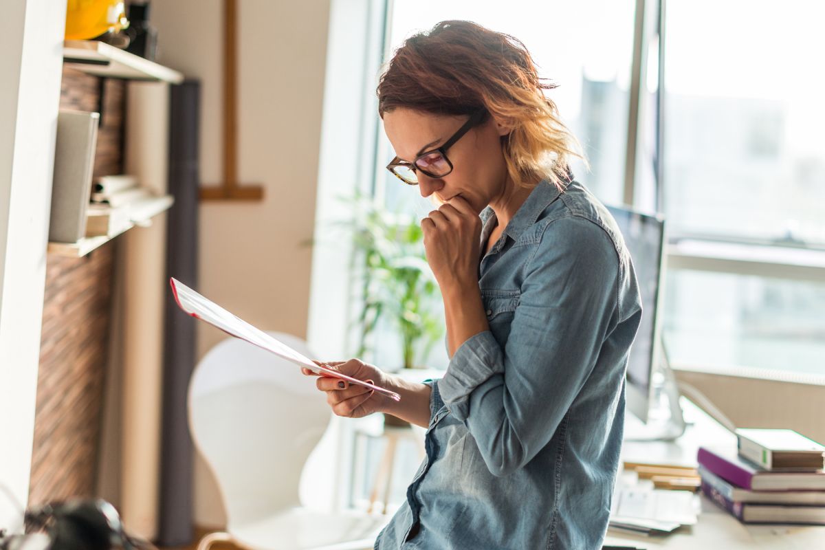 A picture of someone reviewing papers.