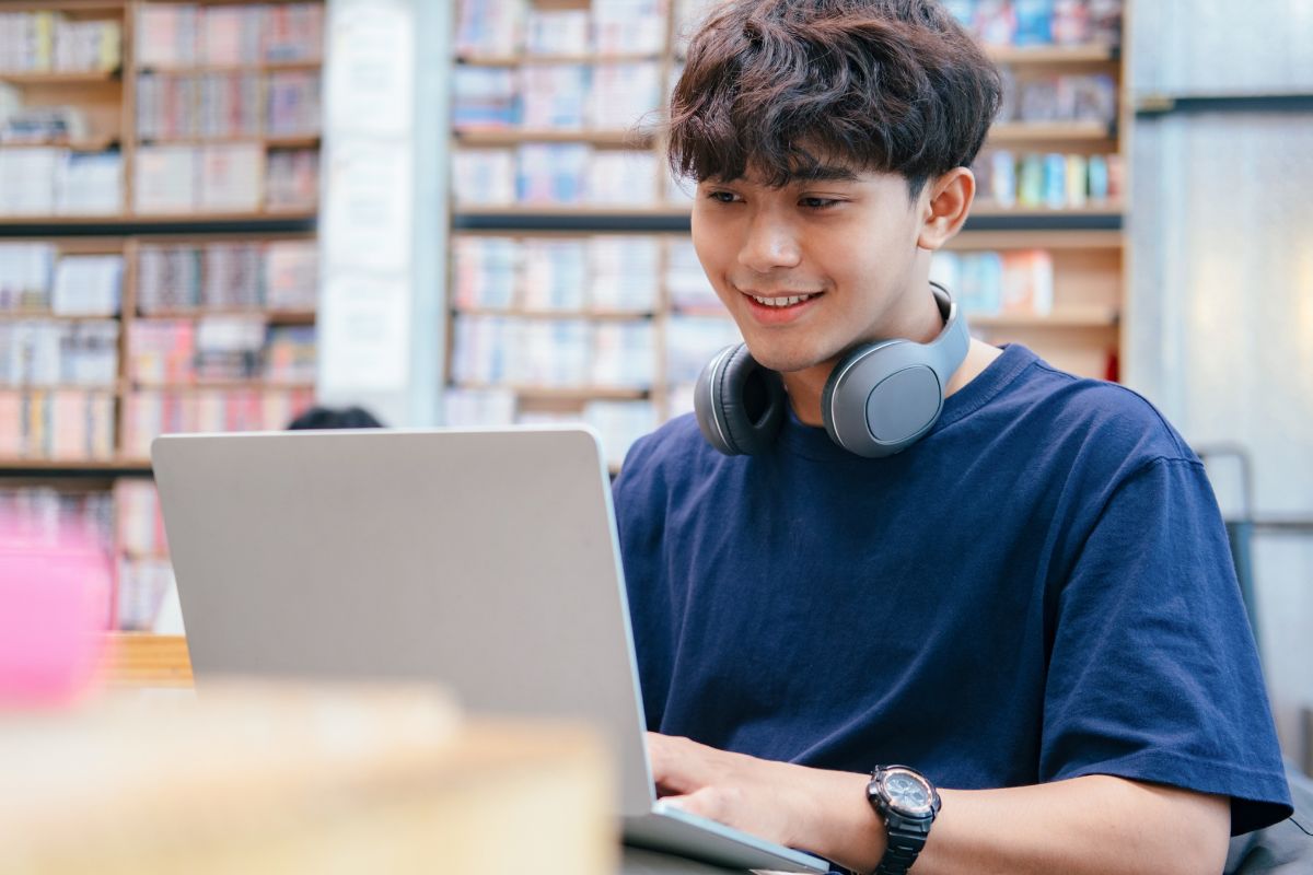 A picture of someone using their laptop.