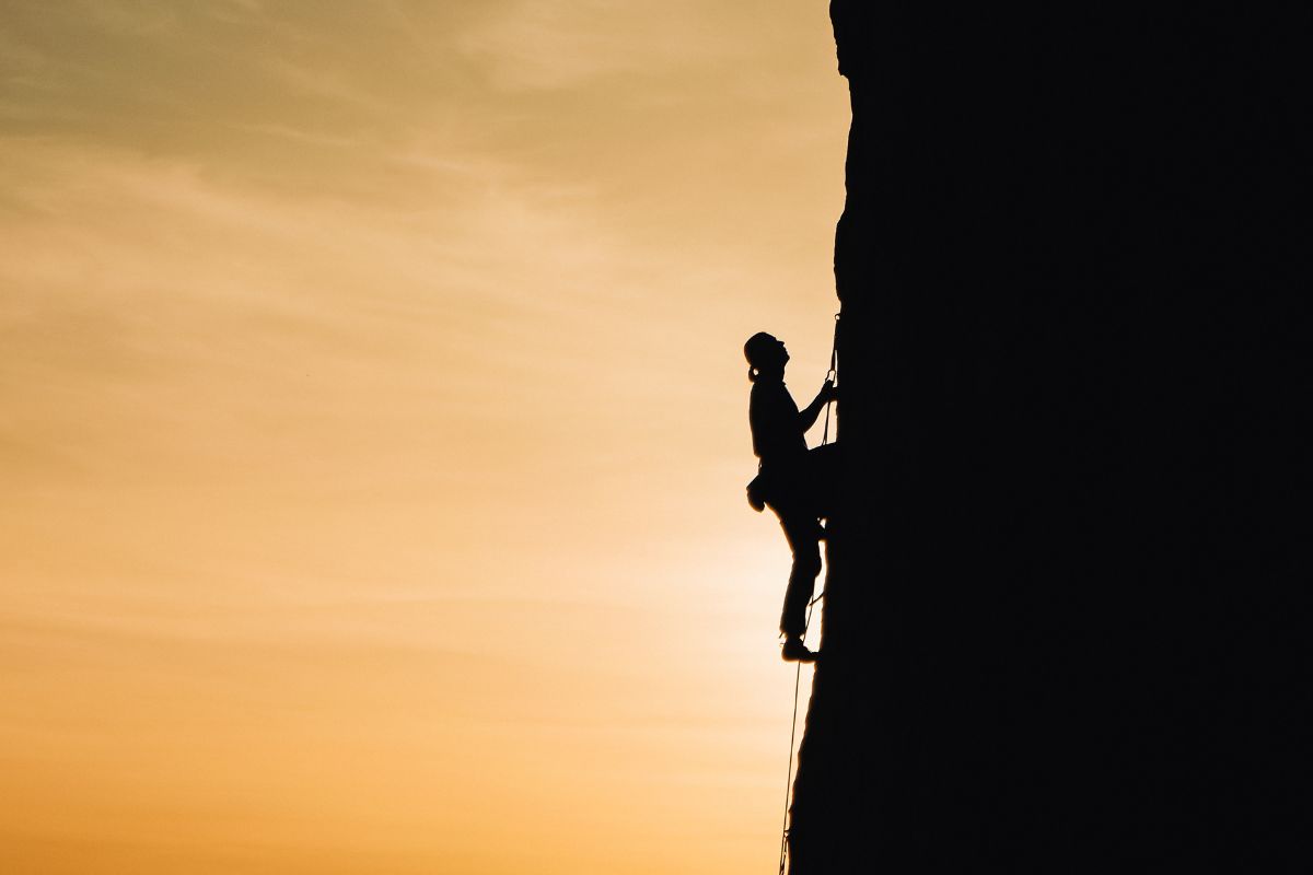 A picture of someone climbing.