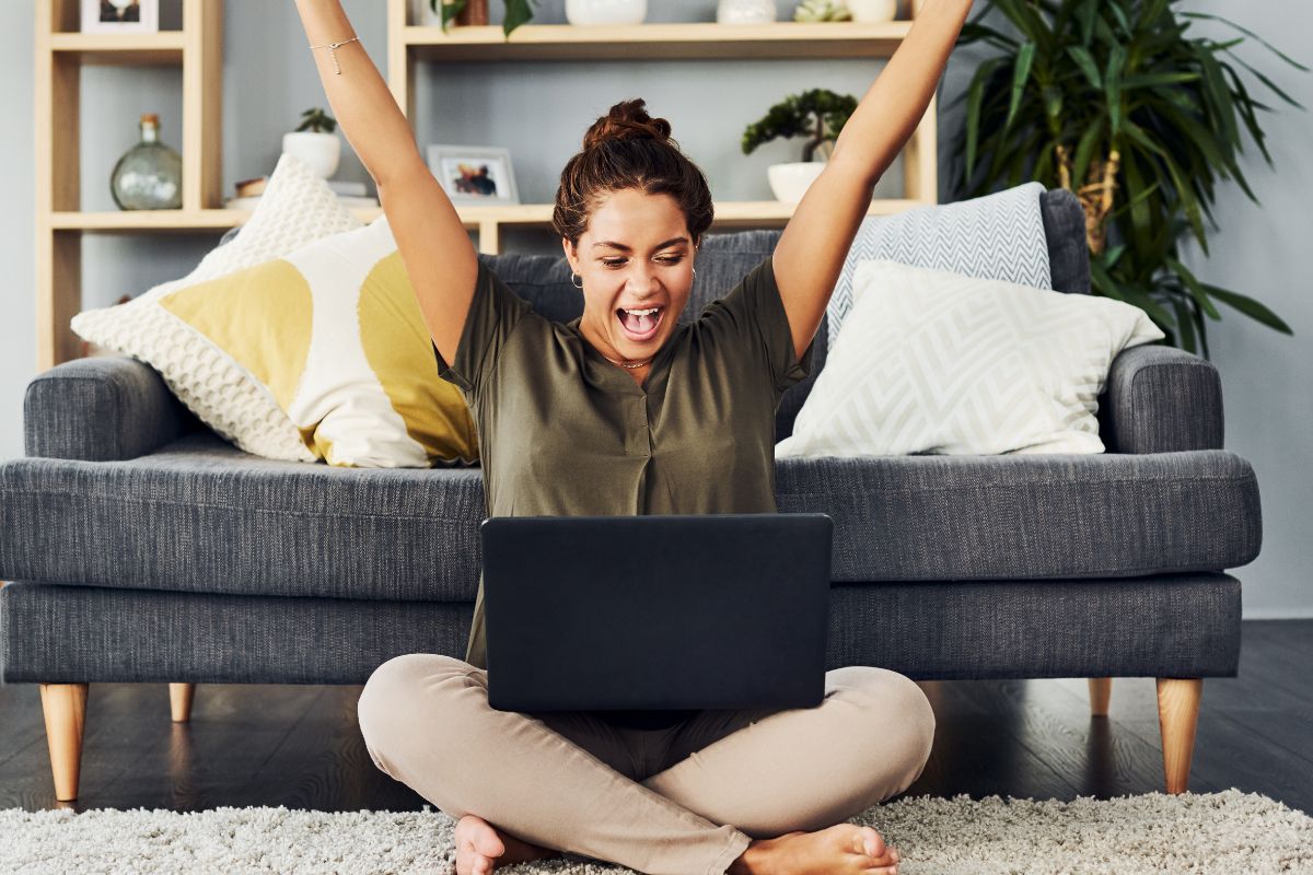 A picture of a woman celebrating.