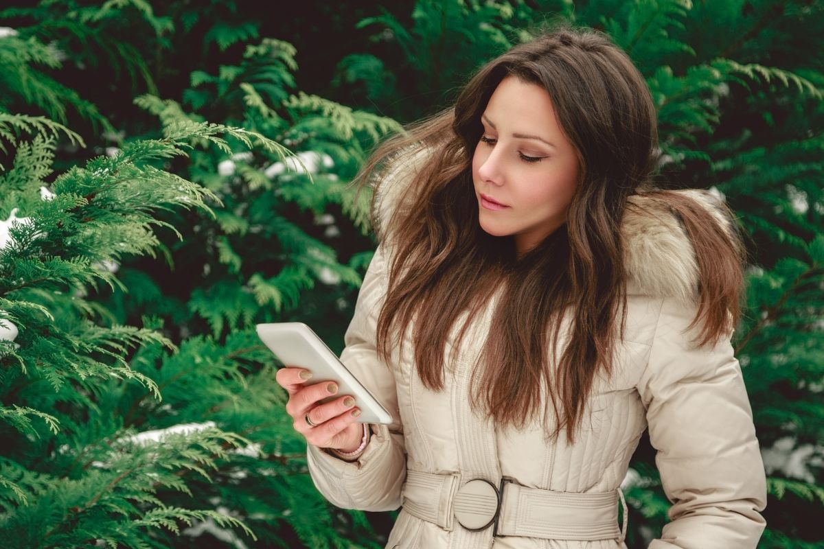 A picture of someone using their phone.