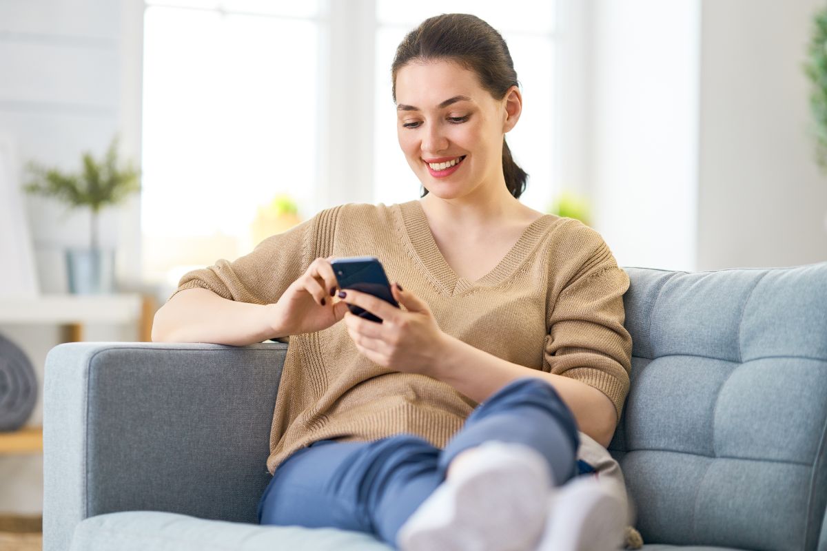 A picture of someone smiling while relaxing.