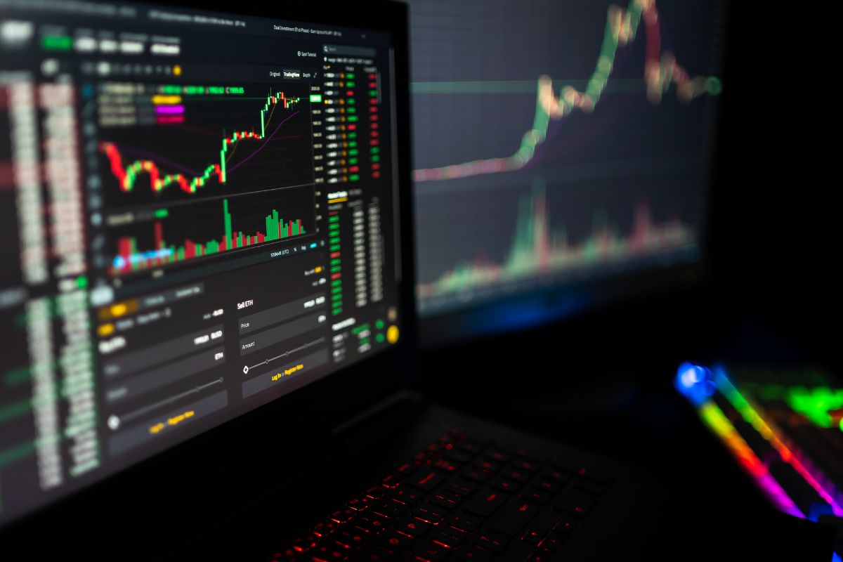 A picture of someone looking at crypto prices.