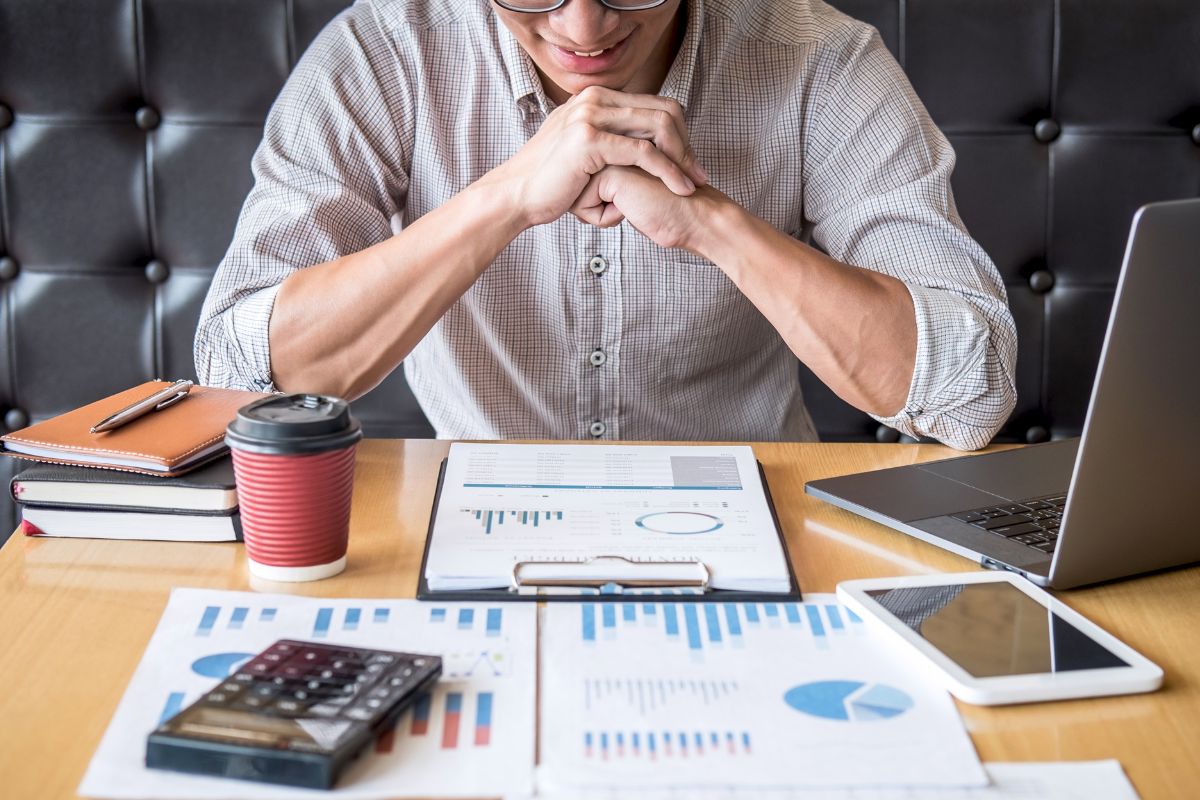 A picture of someone looking at graphs.