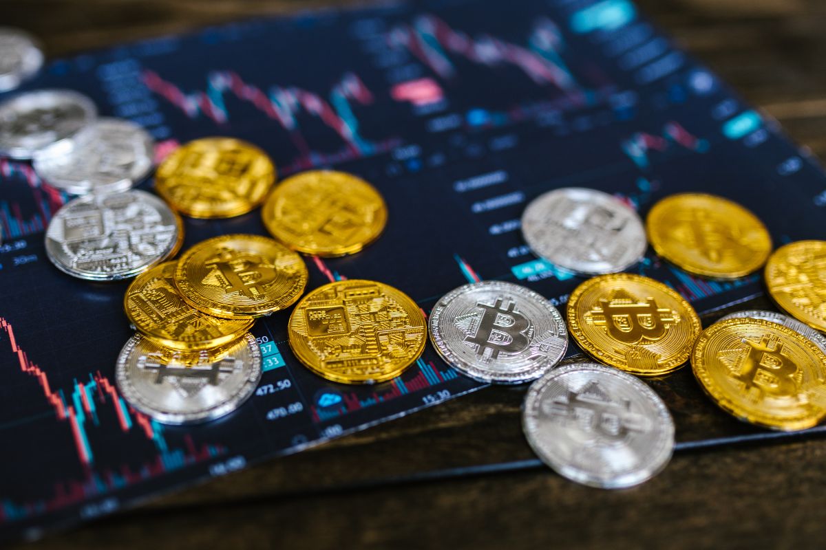 A picture of crypto tokens and a graph.