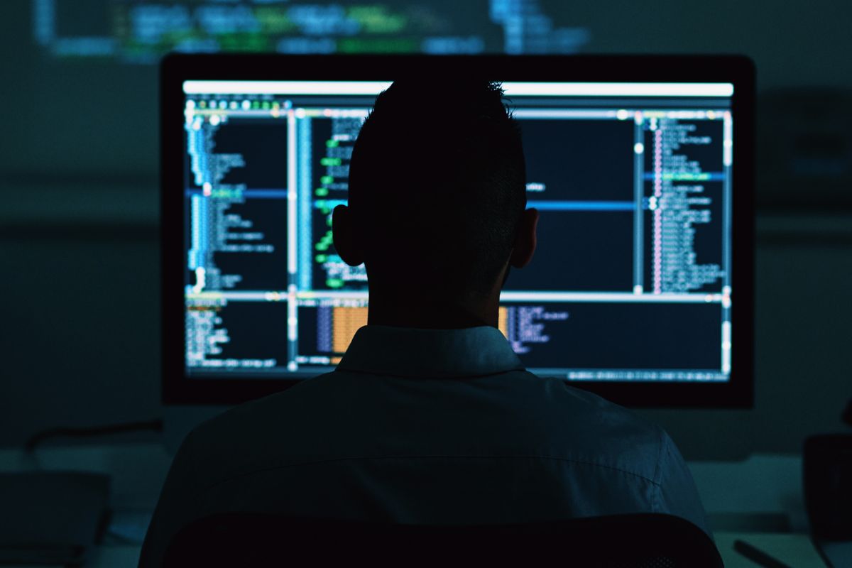 A picture of someone coding.