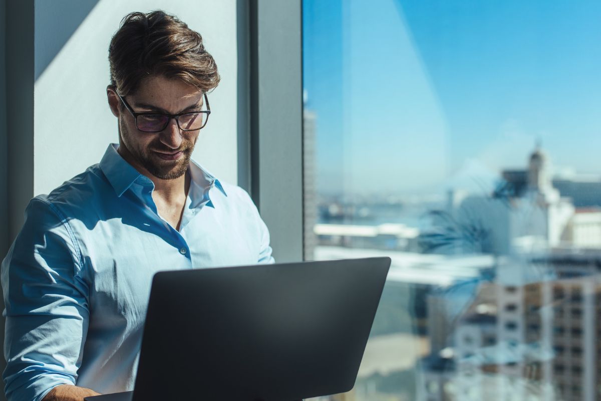 A picture of someone using their laptop.