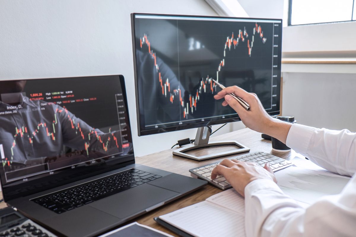 A picture of a trader analyzing stock prices.