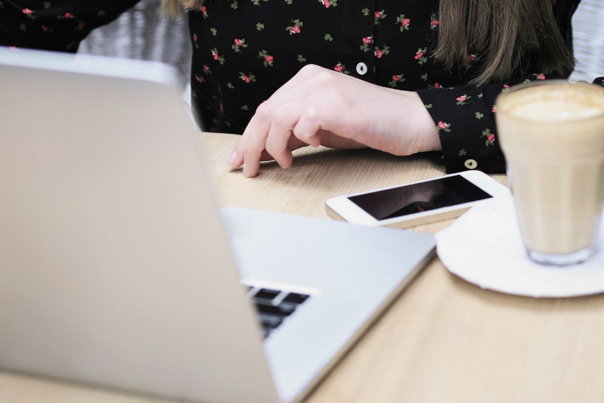 A picture of someone using a laptop.