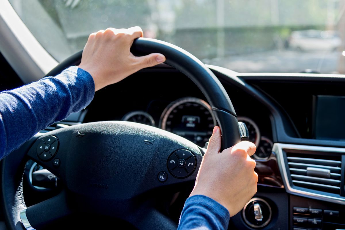 A picture of someone driving.