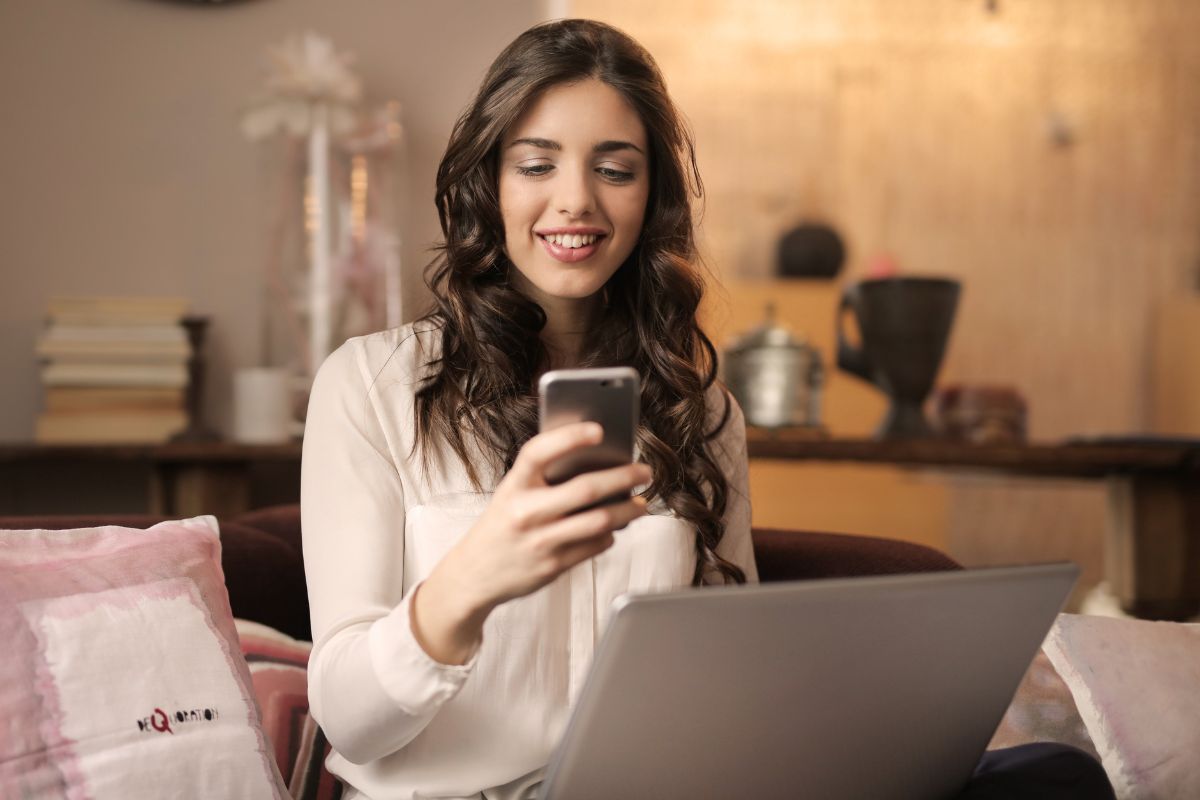 A picture of someone using their phone.