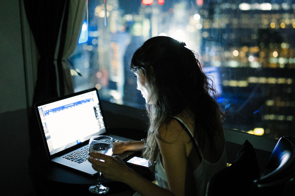 A picture of someone working at night.