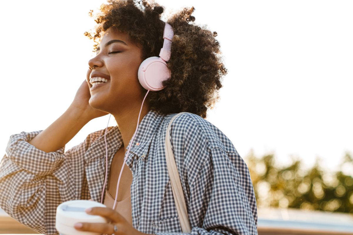 A picture of someone listening to music.