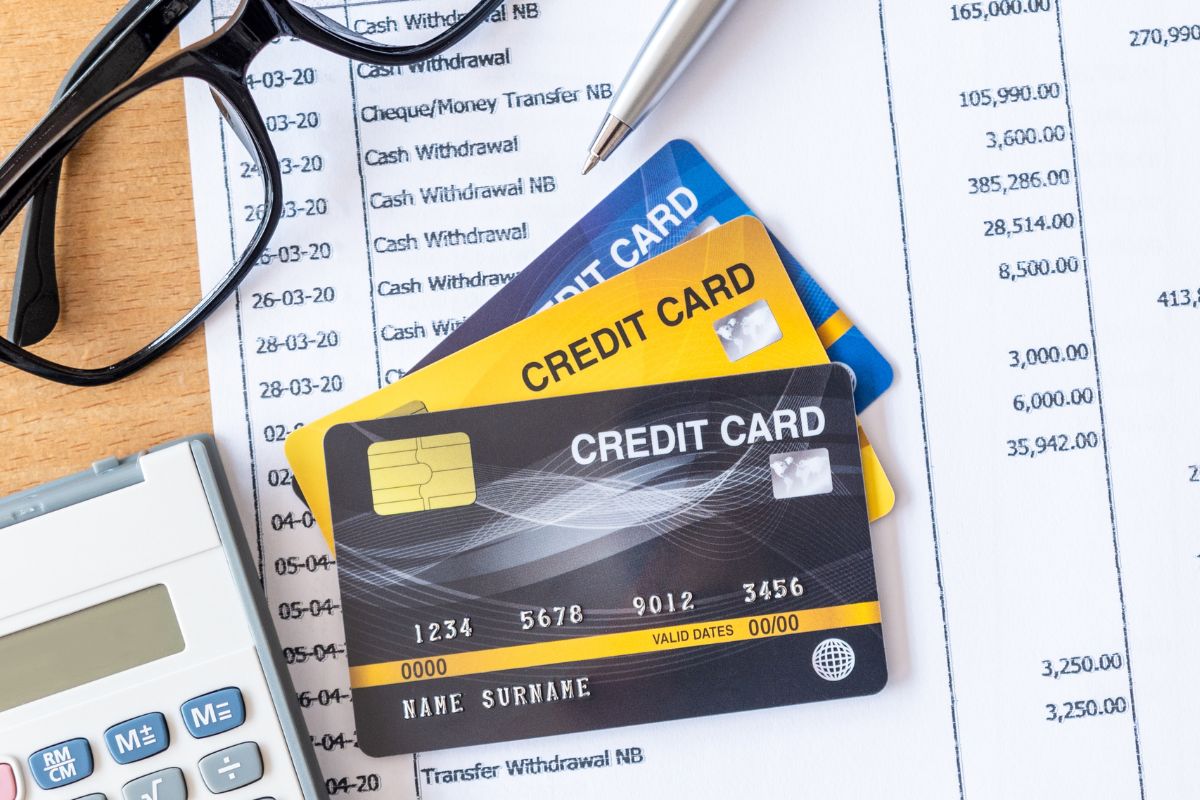 Photo of credit cards and balance statements.