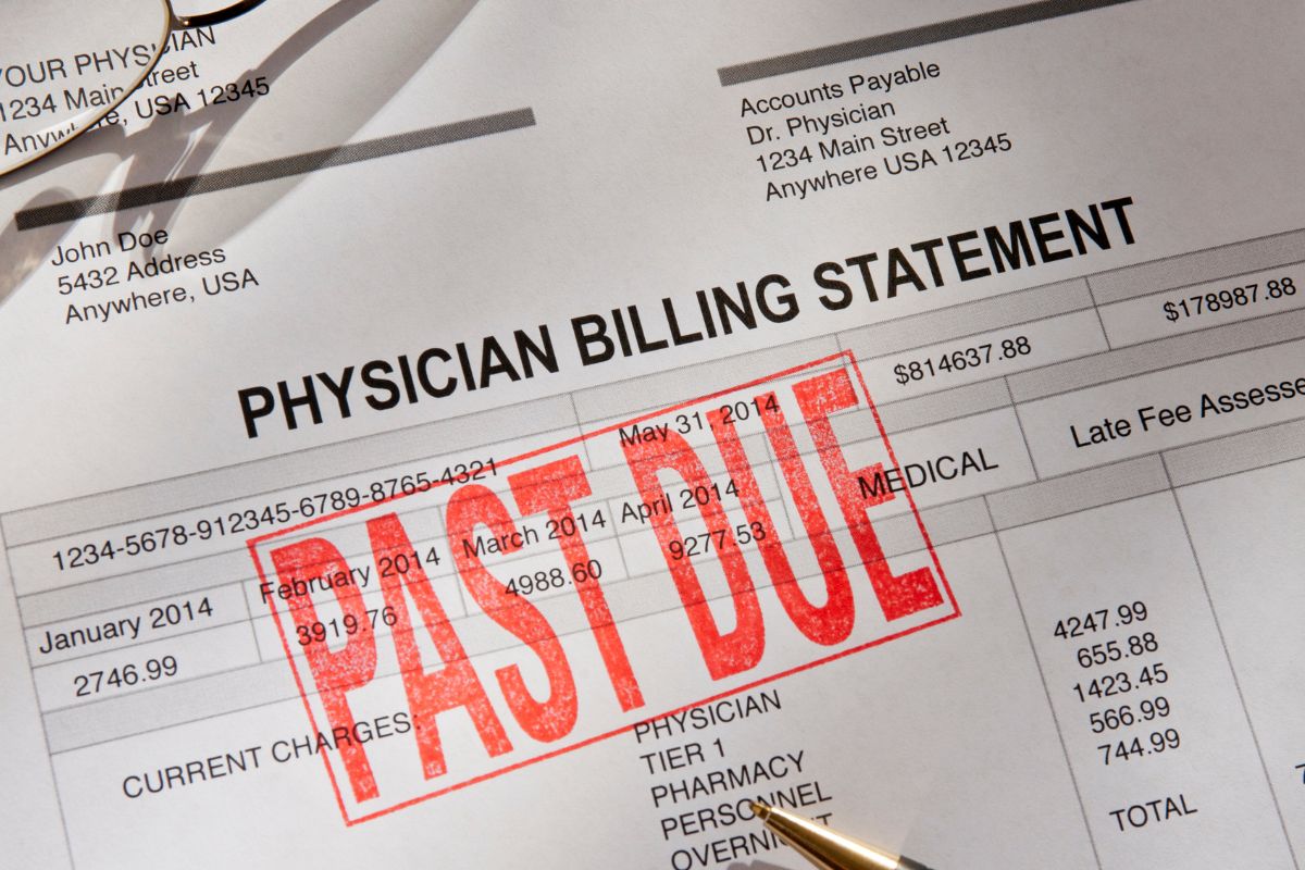 Photo of a past due billing statement.