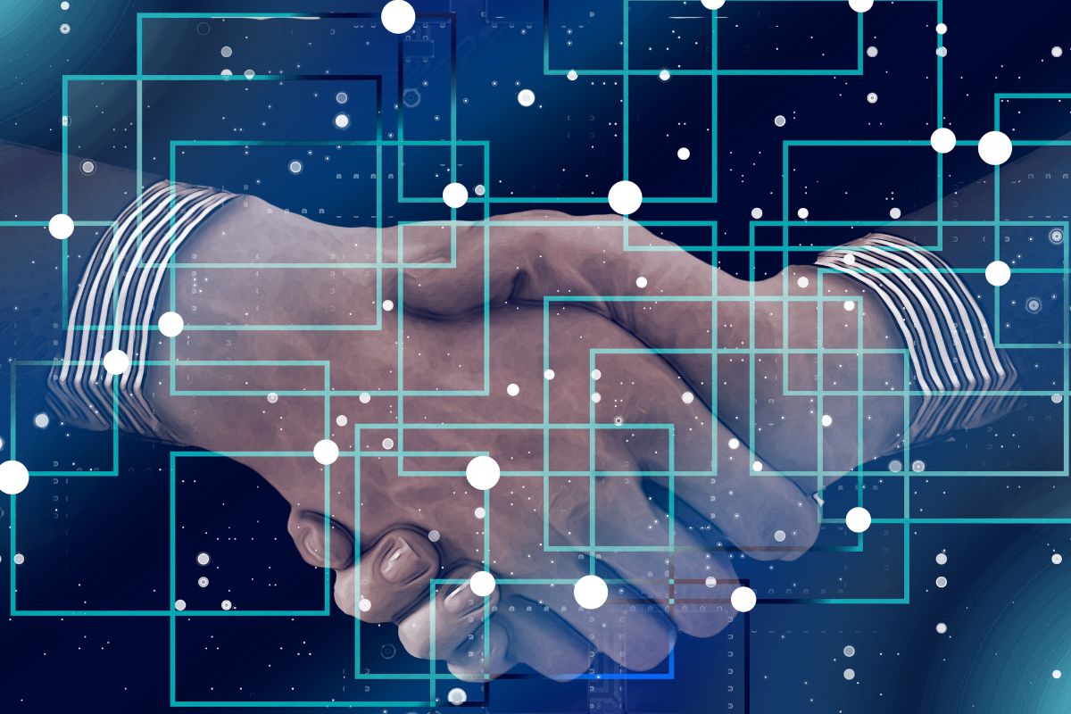 A picture of people shaking hands.