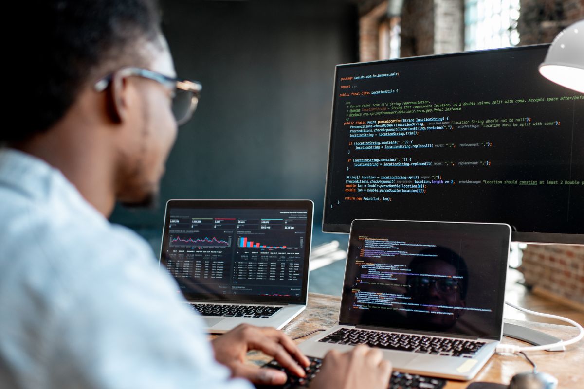 A picture of someone coding.