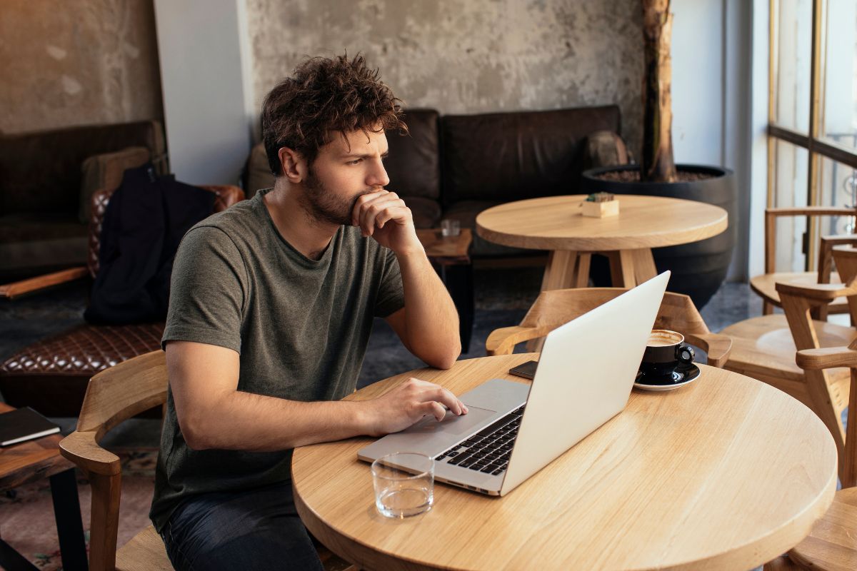 A picture of someone using their laptop.