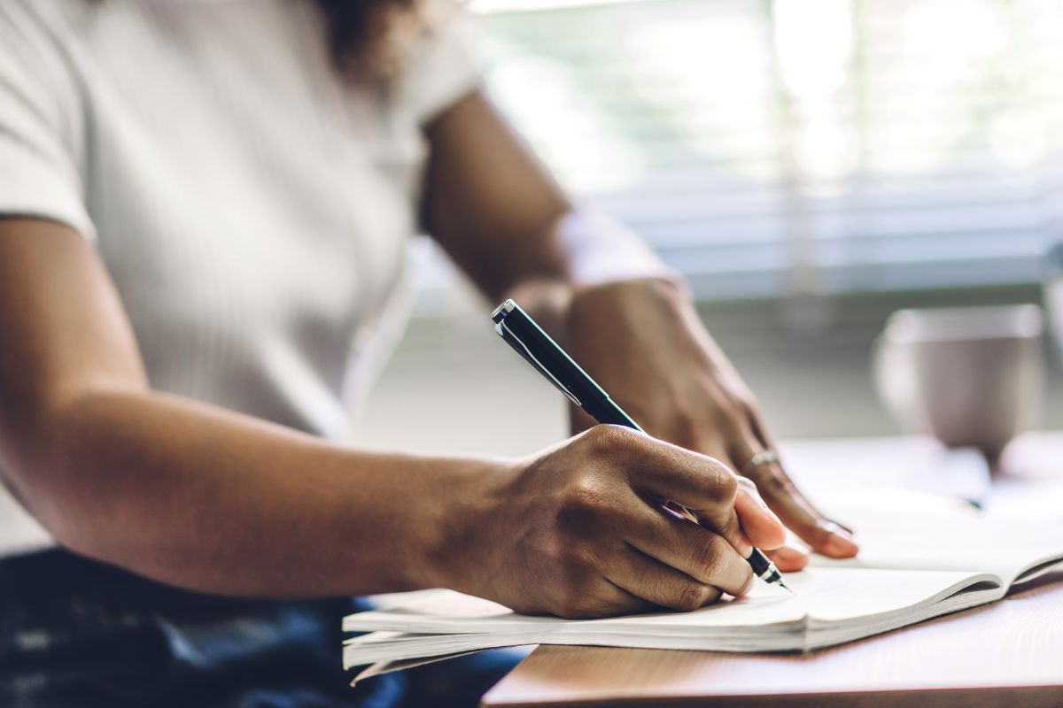 A picture of someone writing something.