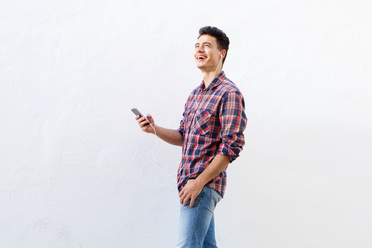 A picture of someone happy while walking.