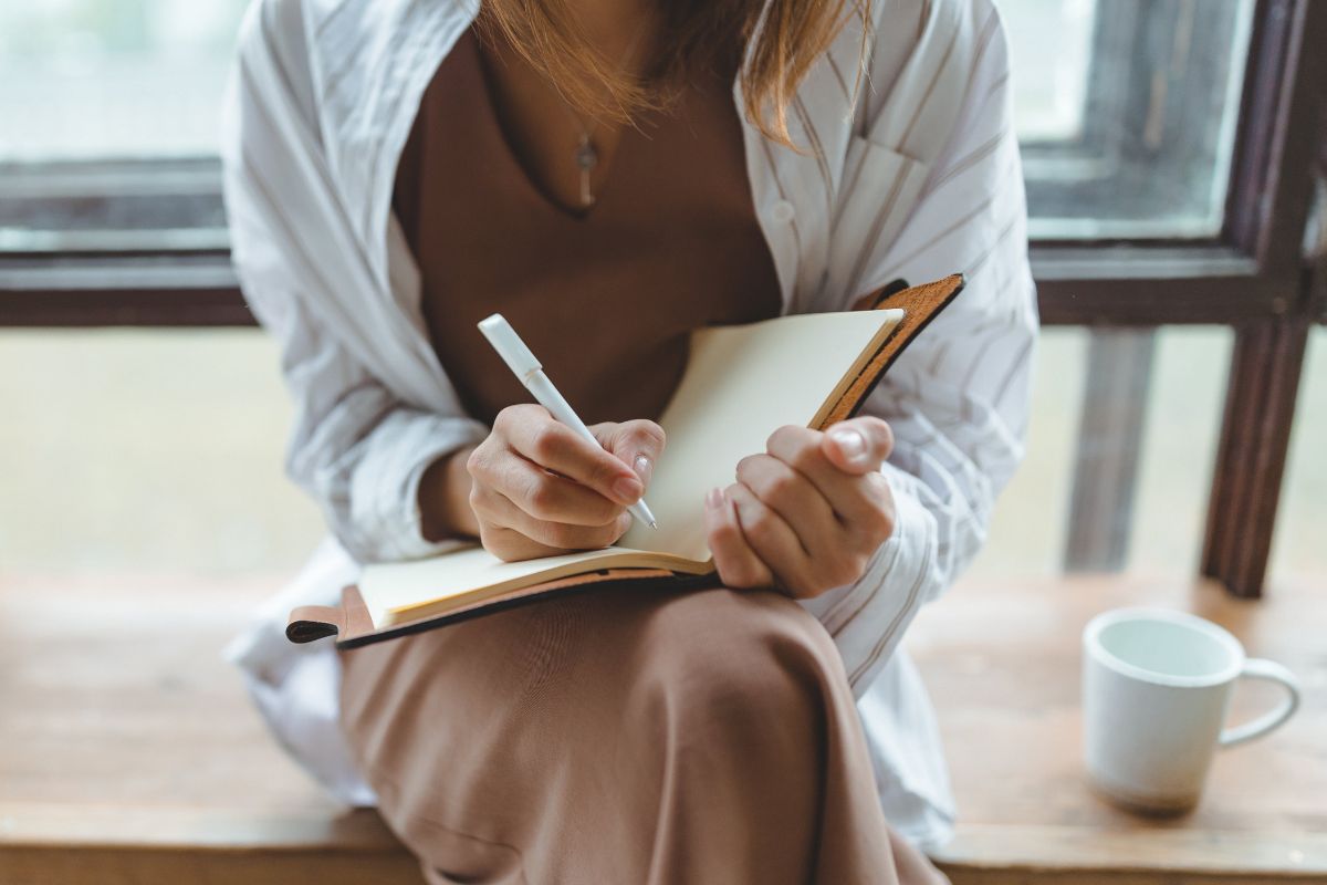 A picture of someone writing something.