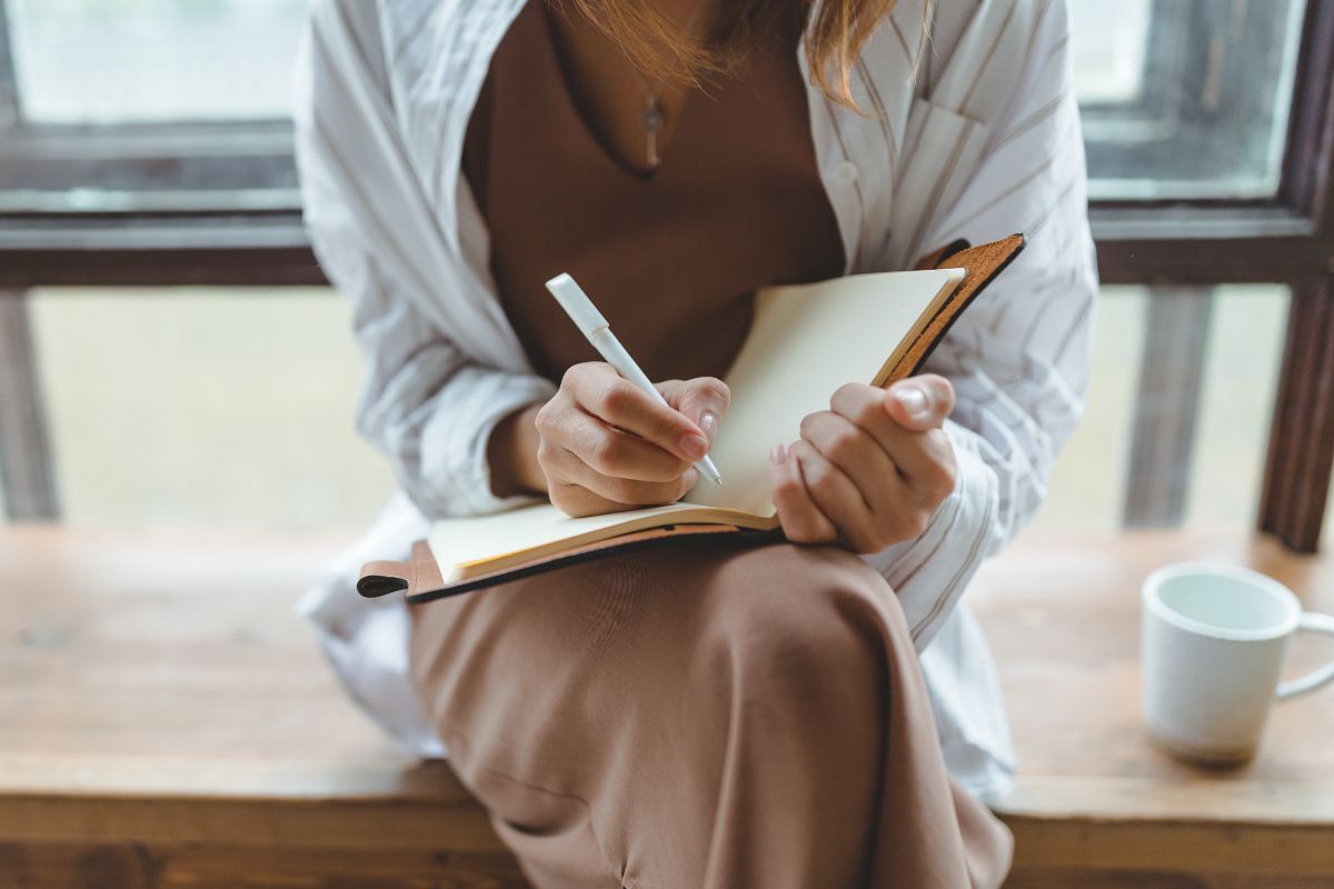 A picture of someone writing something.