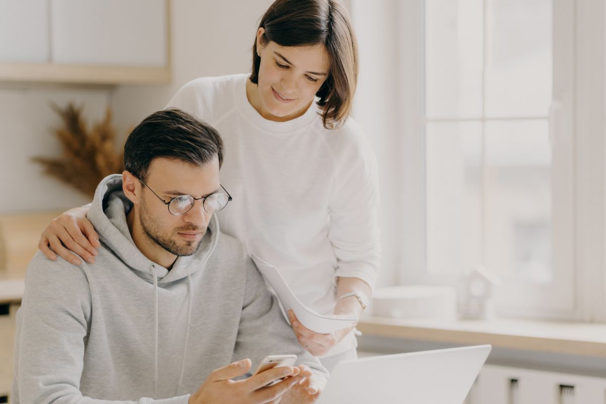 A picture of a couple reviewing their finances.