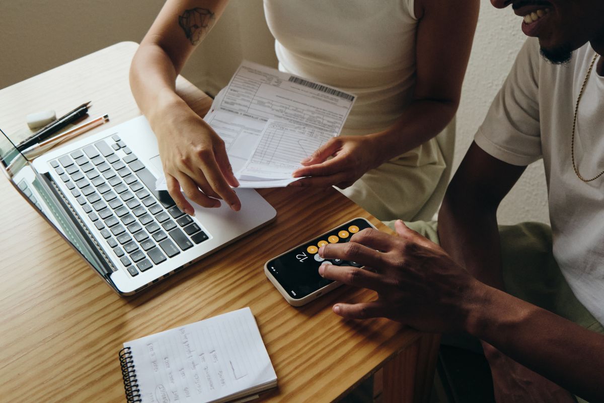 A picture of a couple reviewing their finances.