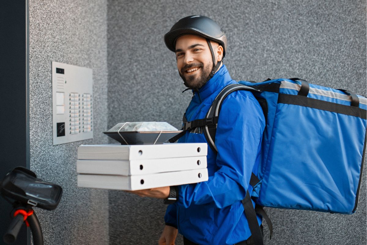 A picture of a food deliveryman.