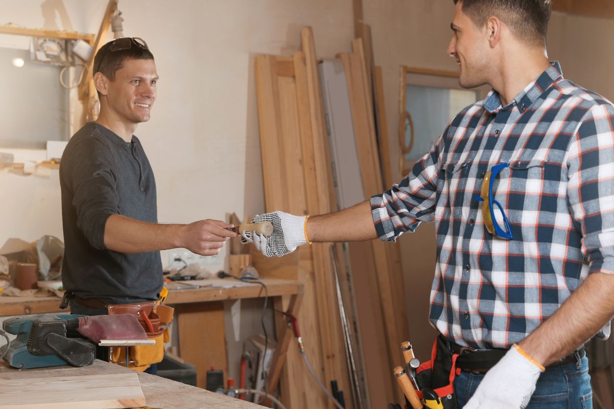 A picture of someone lending tools.