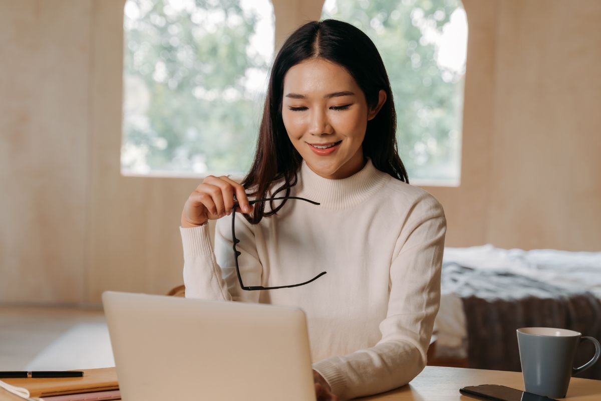A picture of someone using their laptop.