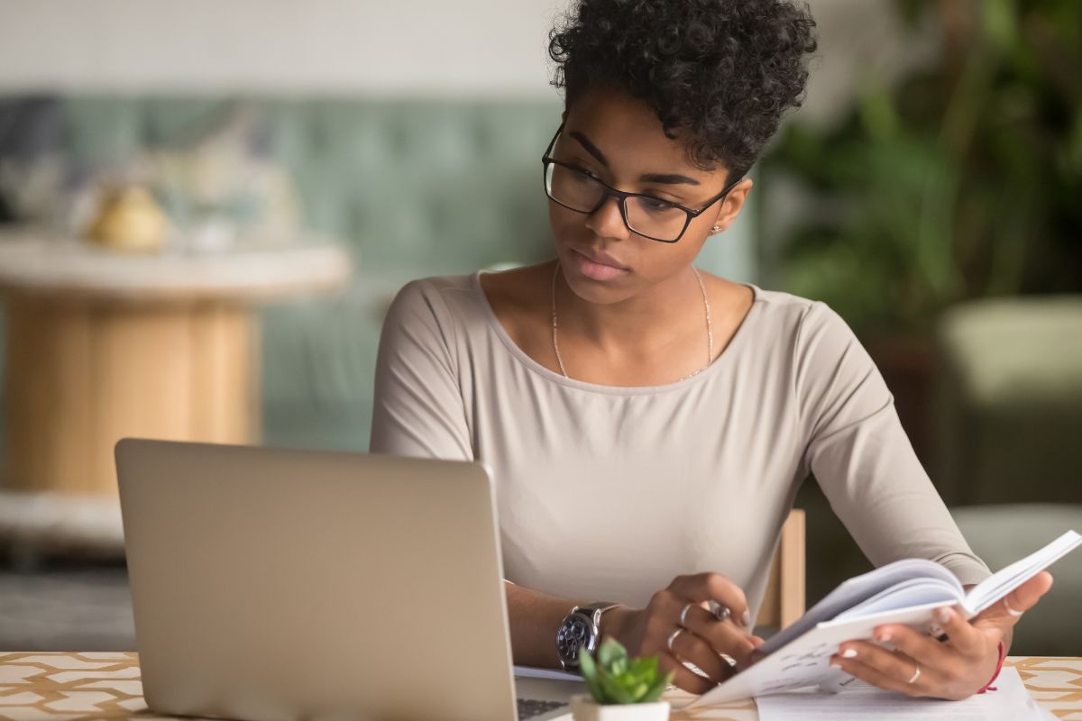 A picture of someone taking notes.