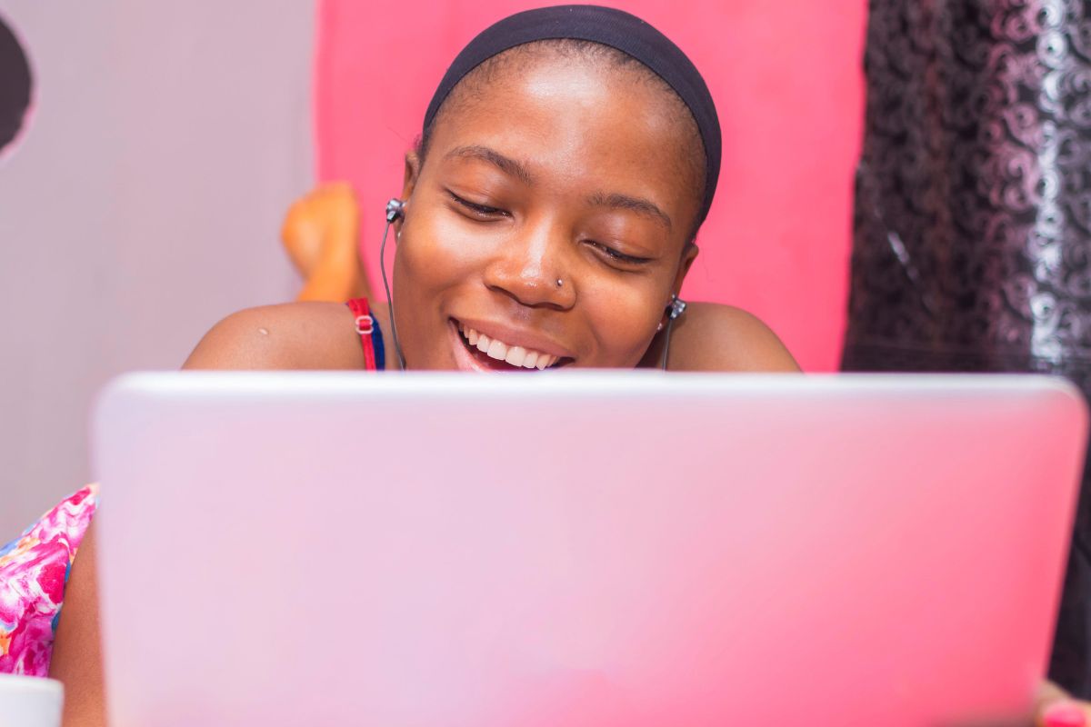 A picture of a female watching something.