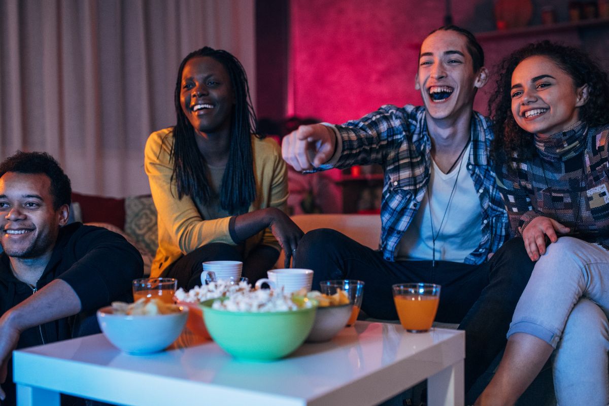 A picture of teens watching a movie.