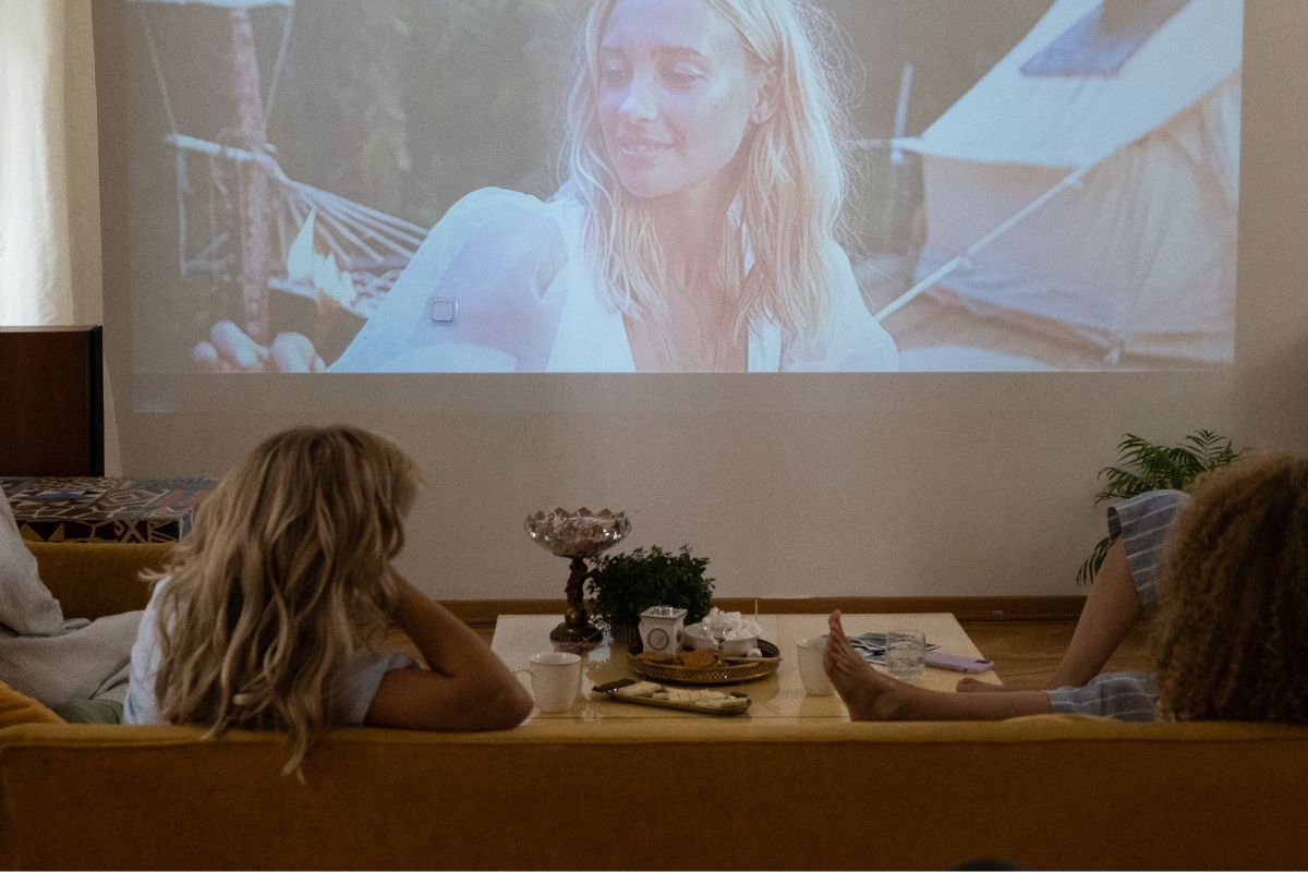 A picture of women watching a movie.