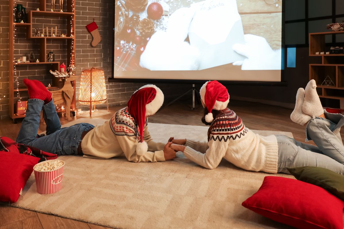 A picture of a couple watching a movie.
